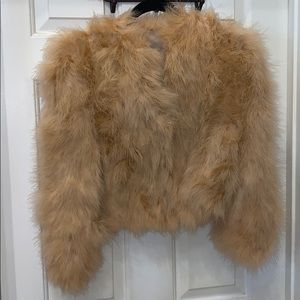 Lined hand sewn fur coat